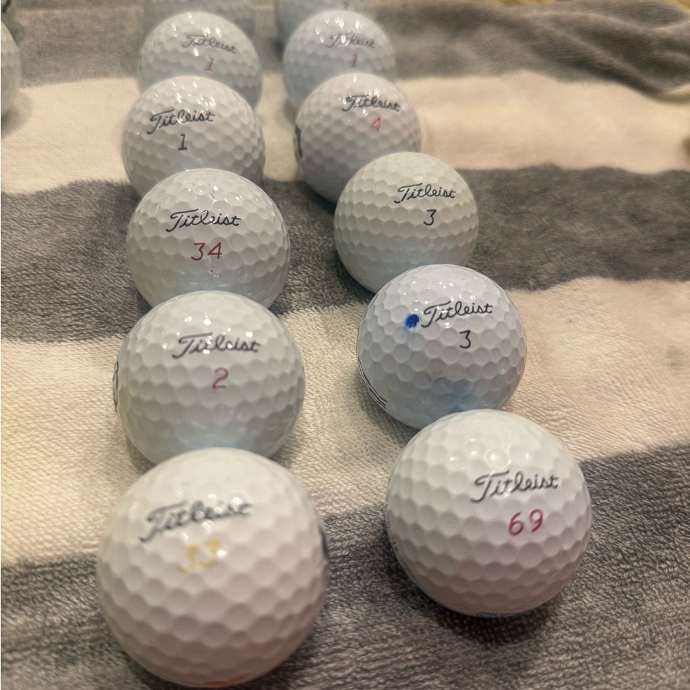 Referbished Titleist White and Red Numbered Golf Balls